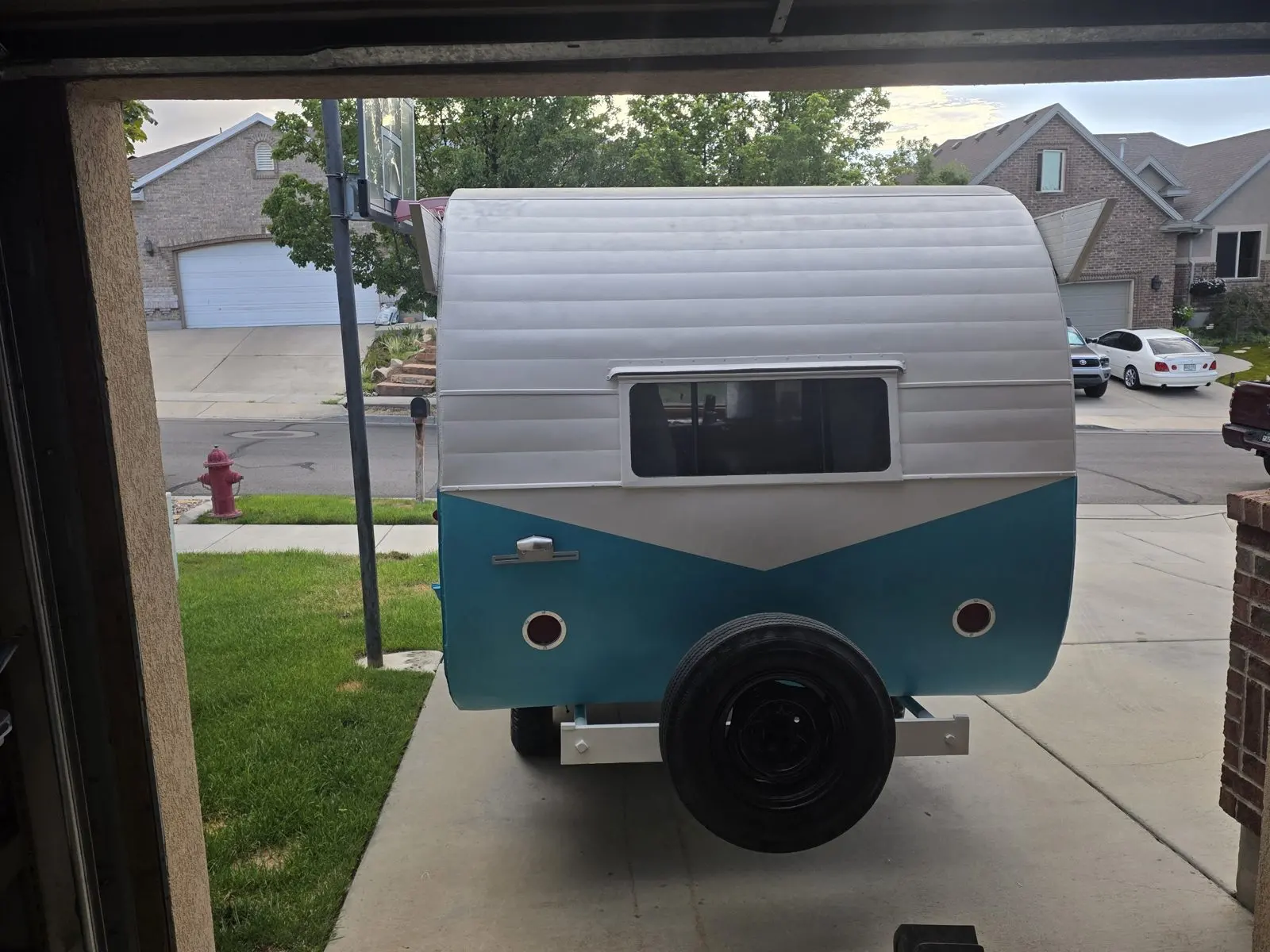 Restored rear exterior with its spare tire.