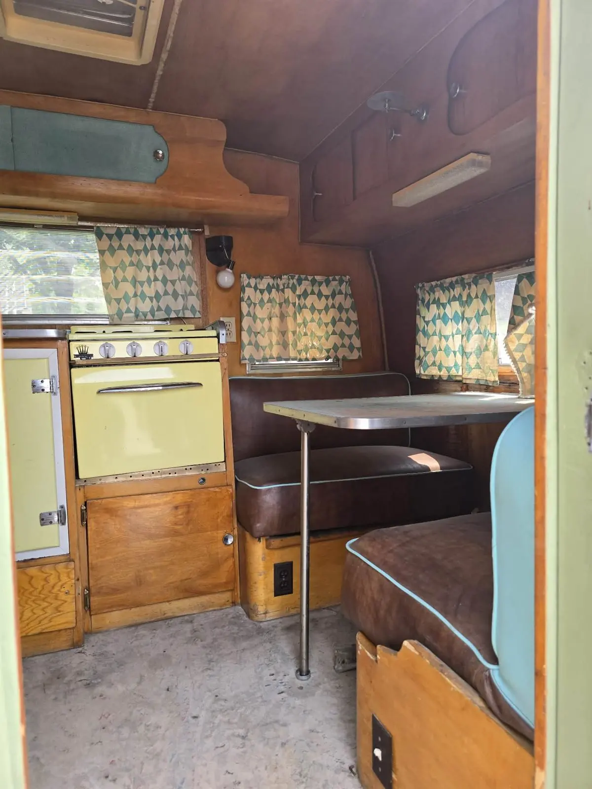 Original galley and dinette viewed from the doorway.