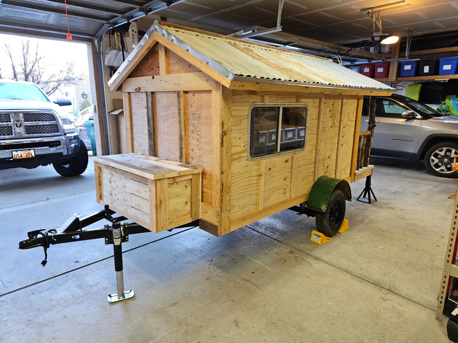 Cabin trailer exterior with front porch and storage counter