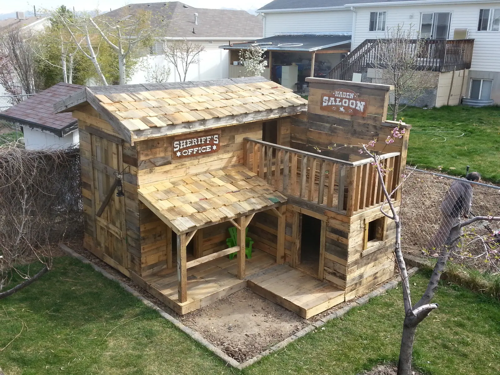 Western pallet playhouse with completed upper level