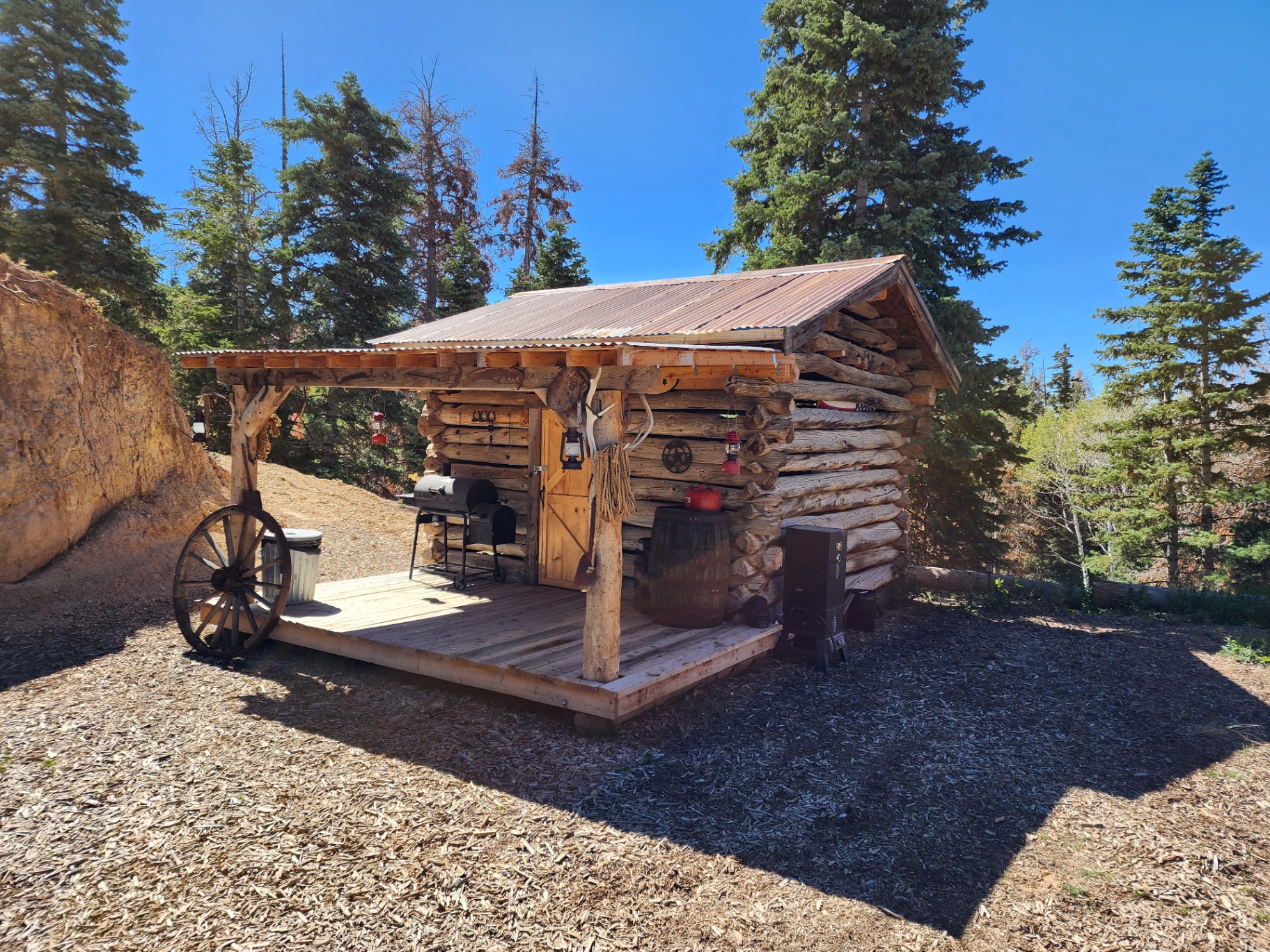 Completed relocated 1890s Holden log cabin