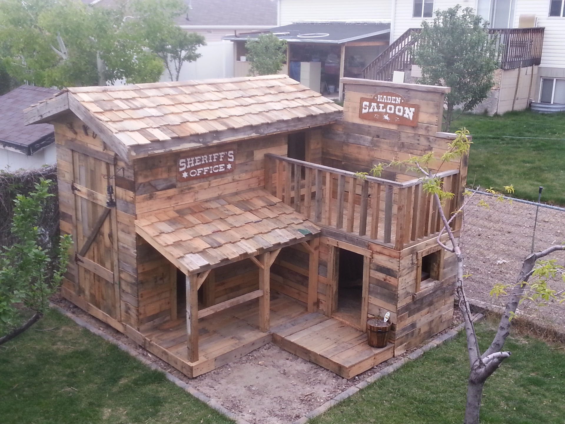Completed western pallet playhouse
