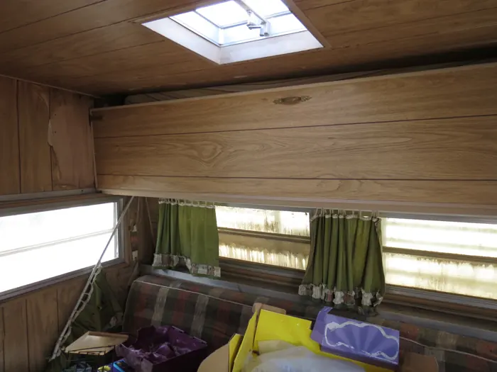 Original seating beneath the long window.