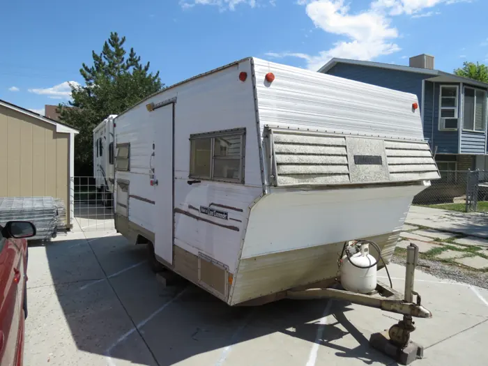 Aristocrat camper exterior before the remodel.