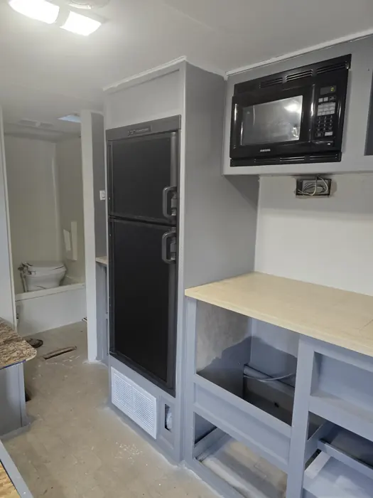 Galley counter and cabinets before the final floor and furnishings.