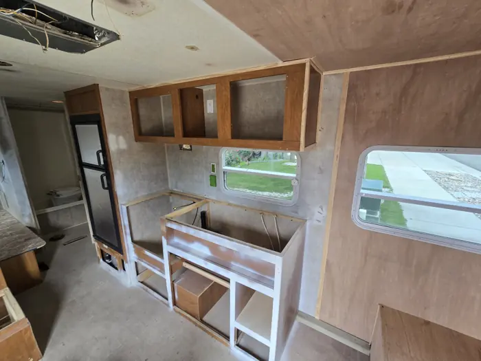 Cabinet surfaces being prepared for paint.