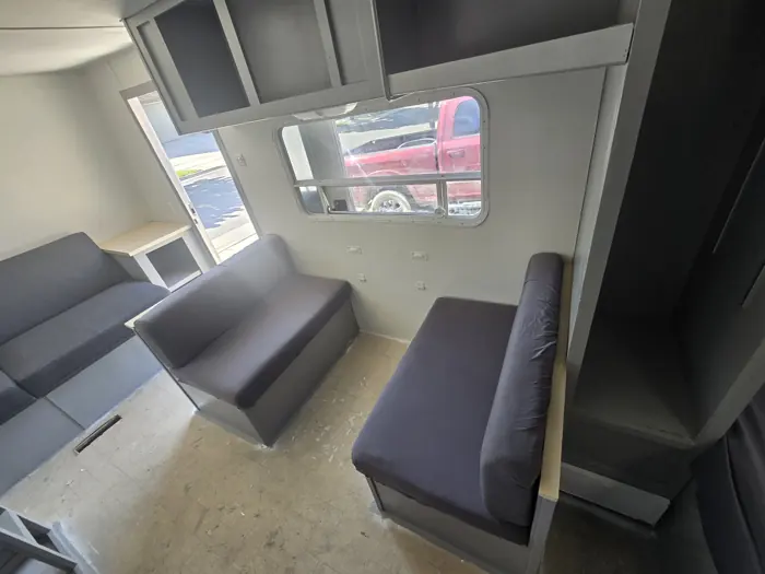 Seating fitted before the new floor and table.