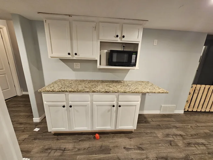 Cabinets with the countertop in place before the refrigerator was added.