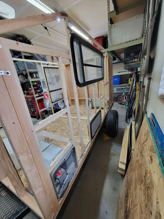 Camper walls taking shape on the trailer.