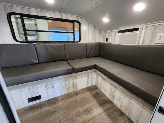 Gray upholstery fitted to the L-shaped seating.