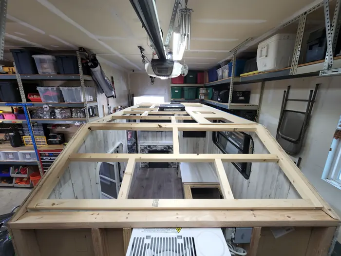 Roof frame spanning the camper walls.