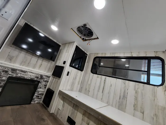 Ceiling panels and recessed lights installed.