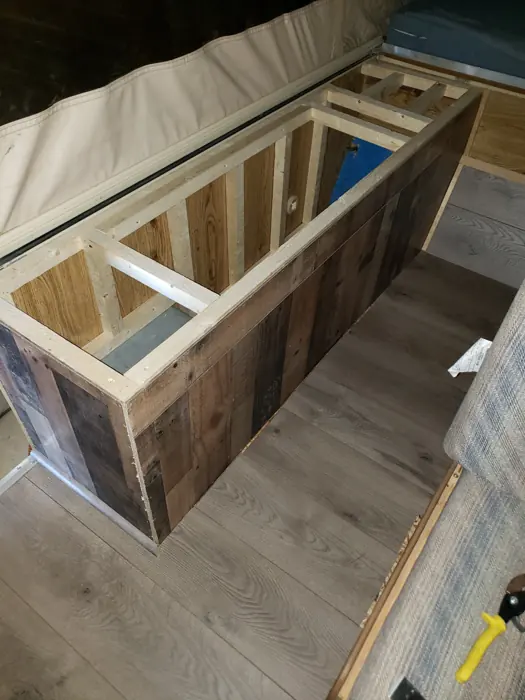 Open bench framing during the interior work.
