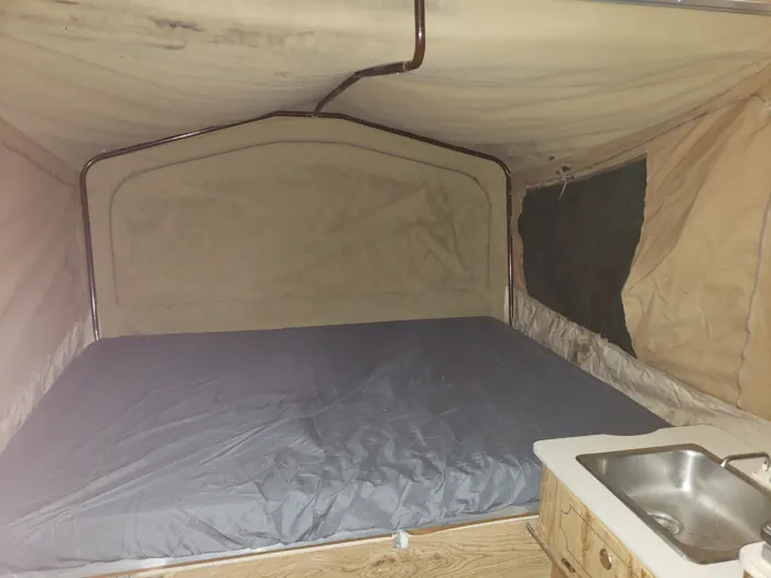 Sleeping area beside the galley.