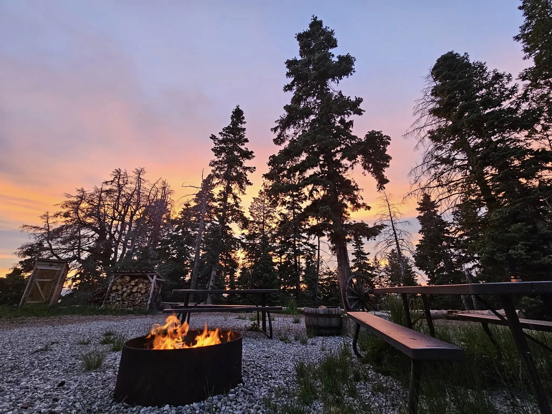 A campfire, picnic table and mountain sunset from Jason’s own photos